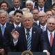 A group of leeches growing fatted on the dying bodies of the poor celebrates without any Bud Light (Photo: Mark Wilson/Getty)